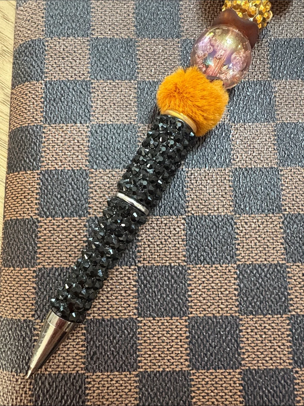 Handcrafted Black Beaded Pen with Orange Squirrel Accent